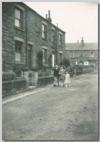 Baz with his Mother and Sister amid the hustle and bustle of downtown Rothwell